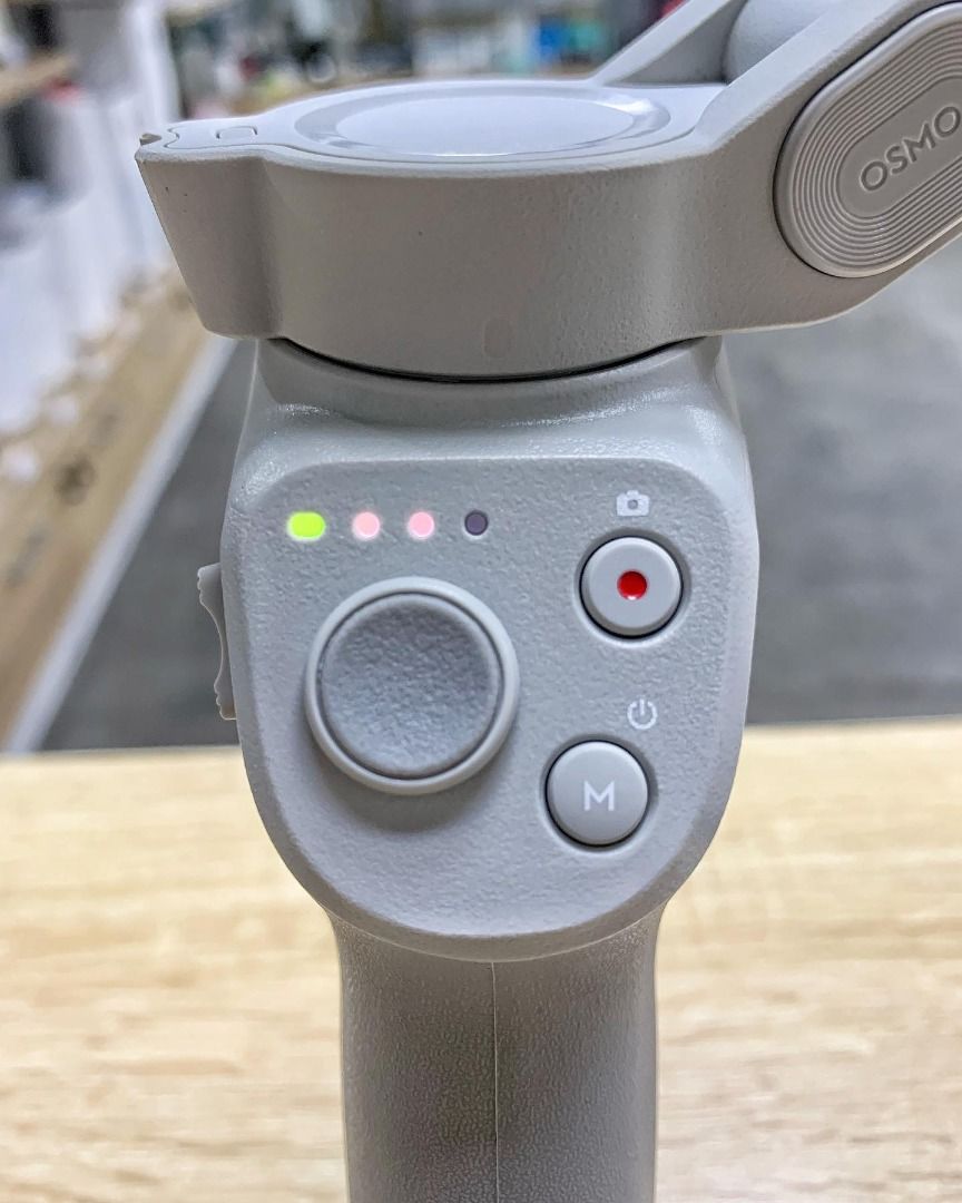 DJI Osmo Mobile Gimbal Stabilizer (Category: Gimbals & Stabilizers ) located in Caloocan City. Submitted by truehawk.889b68 (Listing ID 1432026639, Image 1). Description: - DJI Osmo Mobile gimbal stabilizer for smartphones - Control panel with power, mode, and record buttons - Secure phone clamp - Battery indicator shows charge remaining - Compact and portable design for smooth video capture.