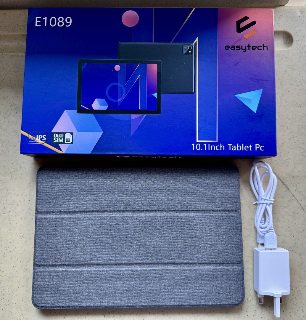 Easytech E1089 10.1-inch Tablet PC (Category: Android) located in Quezon City. Submitted by josephgab86932 (Listing ID 1432066981, Image 1). Description: Easytech E1089 10.1-inch tablet with Android OS. Features a 1280x800 pixels Full HD IPS display, 5.0MP front camera, and 13.0MP rear camera. Includes a dual SIM slot and a 5000mAh battery. Comes with a case, charger, and charging cable. Box opened just to check the product and its inclusions.