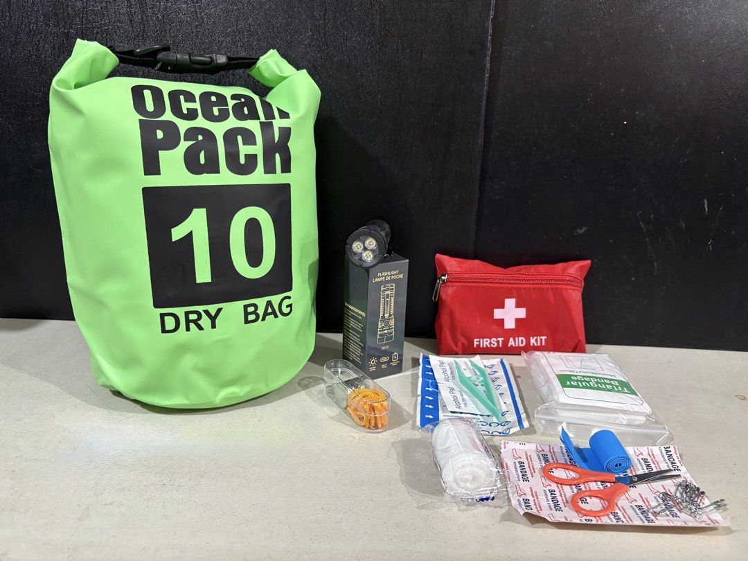 Emergency Go Bag (Category: Medical Supplies & Tools) located in Manila. Submitted by luv.mnl (Listing ID 1432026518, Image 2). Description: Contents: - 10 Liters Dry bag - Emergency Kit (inclusions: 1 pc. Triangle Towel, 10 pcs. Safety Pins, 1 roll PBT Elastic Bandage, 1 pc. Scissors, 2 packs Sterilized Gauze Pieces, 1 pc. Latex Tourniquet, 1 roll Non-Woven Tape, 6 pcs. Alcohol Tablets, 10 pcs. Band-Aids, 1 pc. Tweezers, 1 pc. First Aid Pouch) -