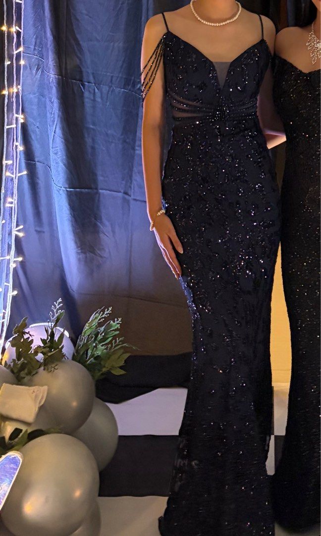 [FOR RENT] Dark Blue Sequin Evening Gown (Category: Evening dresses & gowns) located in Manila. Submitted by bravefire-32ce (Listing ID 1432108218, Image 3). Description: - Elegant dark blue sequin evening gown - Spaghetti straps (adjustable) - Fitted silhouette that flares out - V-neckline with sheer bust panel - Floor-length - Ideal for formal events, proms, and special occasions.