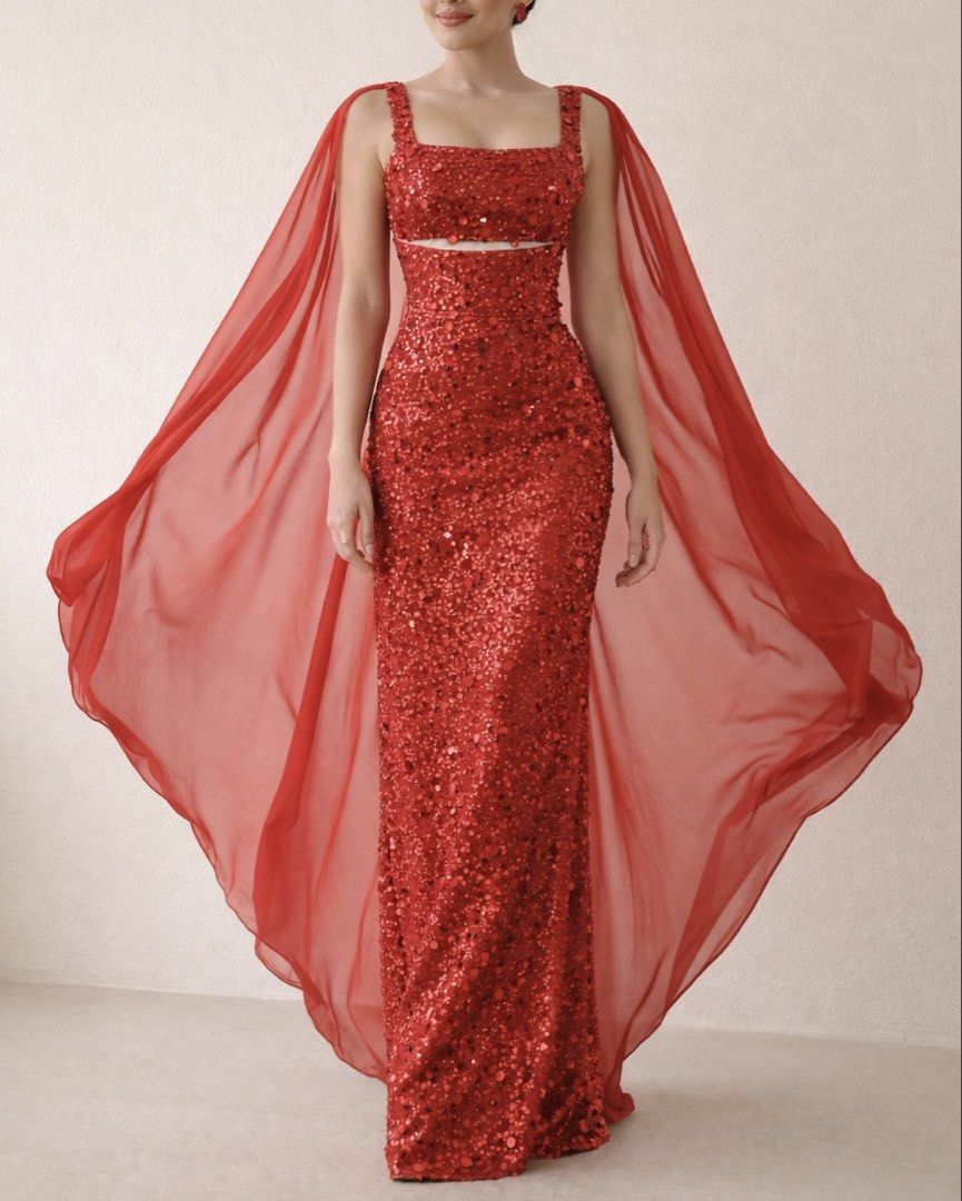 [For Rent] Red Sequin Evening Gown with Cape (Category: Evening dresses & gowns) located in Taguig. Submitted by wornbyangela (Listing ID 1432054304, Image 1). Description: - Red sequin evening gown - Fitted bodice with cutout - Floor-length skirt - Matching sheer cape included (can be removed if needed) - Ideal for formal events and special occasions - Designed to make a statement.
