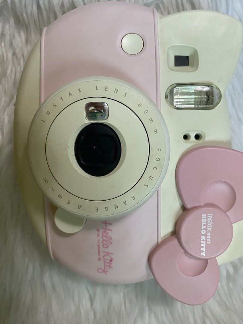 Fujifilm Istax Mini Hello kitty Special Edition (Category: Cameras) located in Malolos. Submitted by yamaguchionline (Listing ID 1432152080, Image 3). Description: FUJIFILM Instax Mini Hello Kitty Special Edition Item Name: FUJIFILM Instax Mini Hello Kitty Instant Camera Condition: Excellent condition with minimal signs of use. Comes with a clear protective case and a lavender ribbon strap. Functionality: Fully tested and working perfectly. Flash