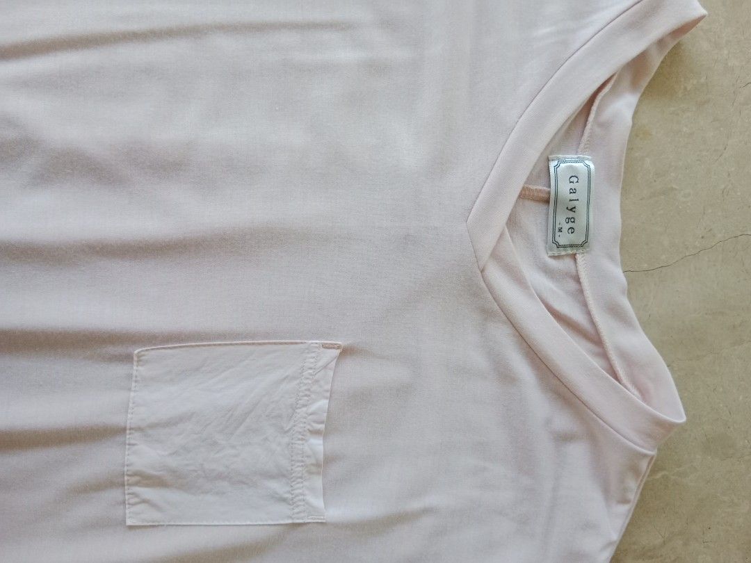 Galype V-Neck Top (Category: Blouses) located in Batangas. Submitted by purplesummer_ph (Listing ID 1432030135, Image 3). Description: - Galype top in light pink - V-neck design - Chest pocket - Relaxed fit - Rolled-up sleeves - Pleated back detail - Longer, layered hemline.