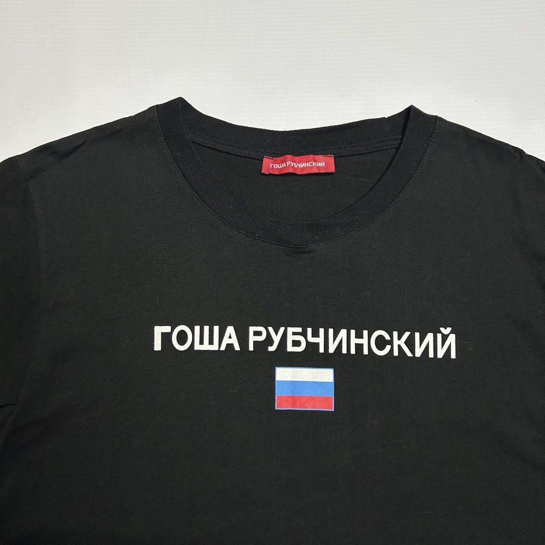 Gosha Rubchinskiy Flag Shirt (Category: Tshirts & Polo Shirts ) located in Antipolo. Submitted by wvyfrnds (Listing ID 1432044252, Image 2). Description: Gosha Rubchinskiy Flag Shirt Size: M Color: Black Dimensions (Inches): Length: 27 Width: 18.5 Color Rate: 9/10 Issues - NONE 295 PLUS SF.