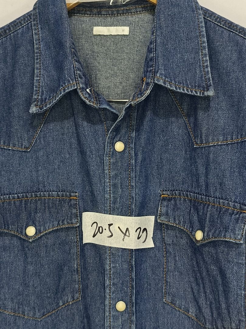 GU Denim Short Sleeve Shirt (Category: Shirts) located in Balamban. Submitted by pncollectionph (Listing ID 1432119796, Image 3). Description: - GU Denim Short Sleeve Shirt - Size: M - Color: Classic Blue Denim - Material: 100% Cotton - Features: Two chest pockets, button closures - Measurements: 20.5 x 29.