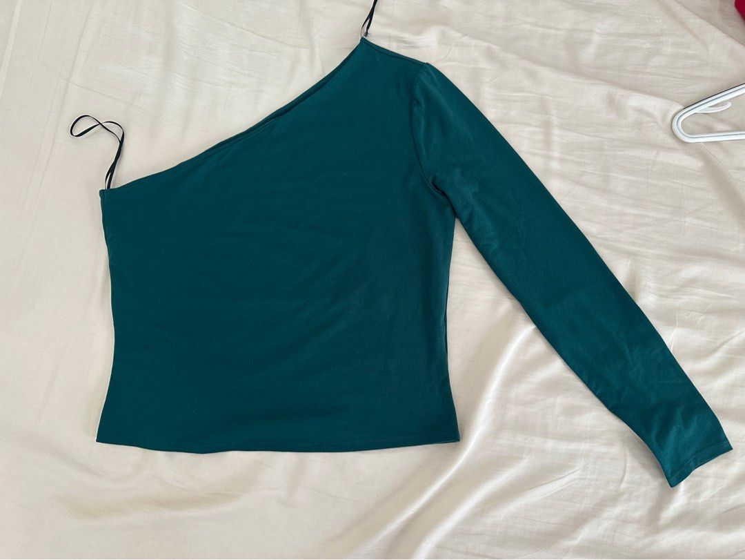 H&M One Shoulder Top - Teal Green - Size L (Category: Sleeveless) located in Quezon City. Submitted by siomyles (Listing ID 1432092834, Image 1). Description: - H&M teal green one-shoulder top - Size: L - Design: Long sleeve - Fabric: Smooth, likely stretchy - Color: Rich teal - Perfect for: Night out or chic casual look.