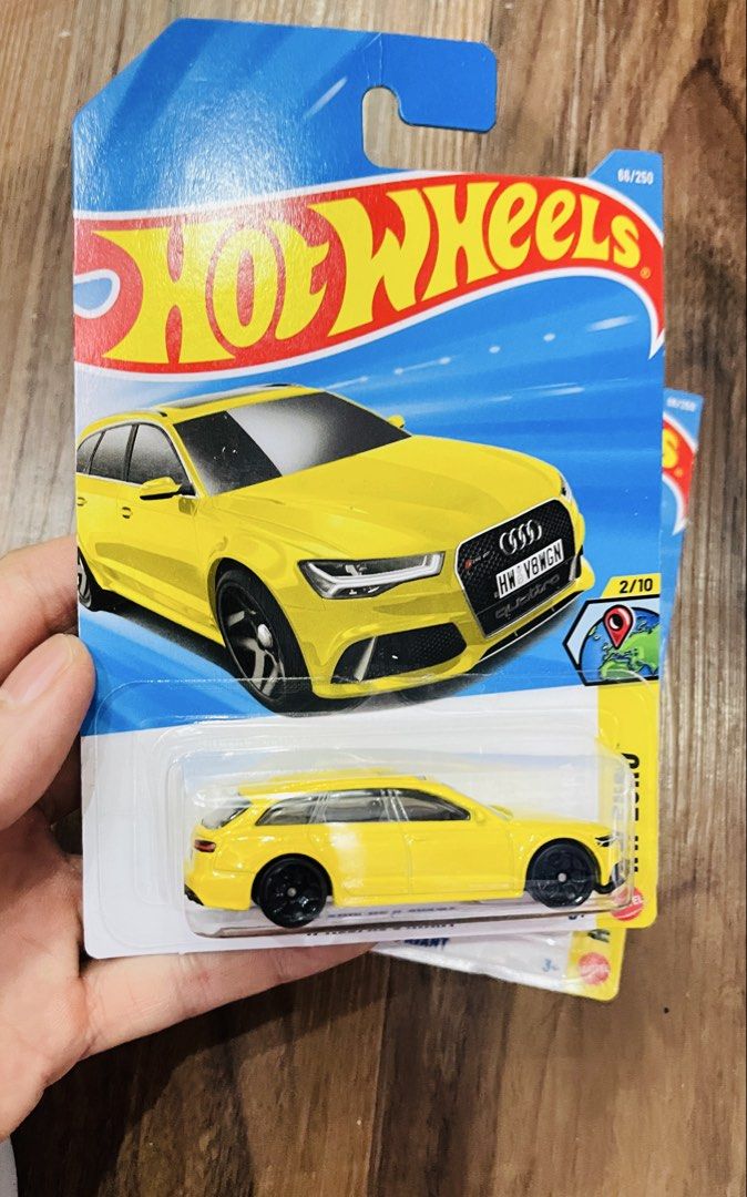 Hot Wheels '17 Audi RS 6 Avant (Category: Vehicle & Diecast Models) located in Quezon City. Submitted by ccgem (Listing ID 1432185997, Image 1). Description: - Hot Wheels '17 Audi RS 6 Avant diecast car. - Part of the HW Euro series. - Color: Yellow - Comes in original packaging. - Model Number: 66/250 - Series: 2/10 - Brand new, card intact, in pristine condition.