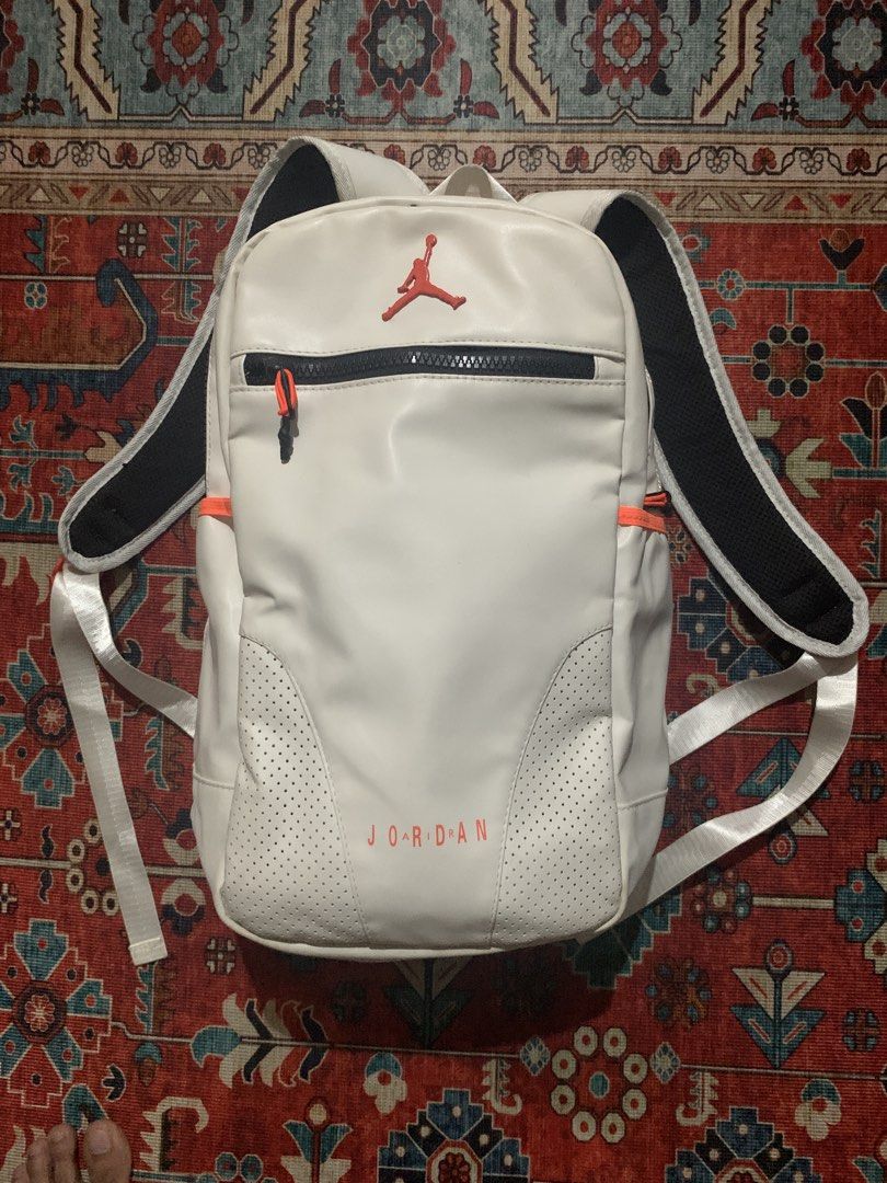 Jordan 6 retro Backpack White (Category: Backpacks) located in Cagayan de Oro. Submitted by chabermz (Listing ID 1432172825, Image 1). Description: - White Jordan backpack with black and orange accents. - Front zip pocket for easy access. - Comfortable padded shoulder straps. - Convenient top handle. - Breathable mesh back panel. - Features Jordan logo on the front. - Includes Nike Air logo..