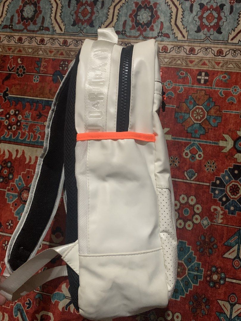 Jordan 6 retro Backpack White (Category: Backpacks) located in Cagayan de Oro. Submitted by chabermz (Listing ID 1432172825, Image 3). Description: - White Jordan backpack with black and orange accents. - Front zip pocket for easy access. - Comfortable padded shoulder straps. - Convenient top handle. - Breathable mesh back panel. - Features Jordan logo on the front. - Includes Nike Air logo..