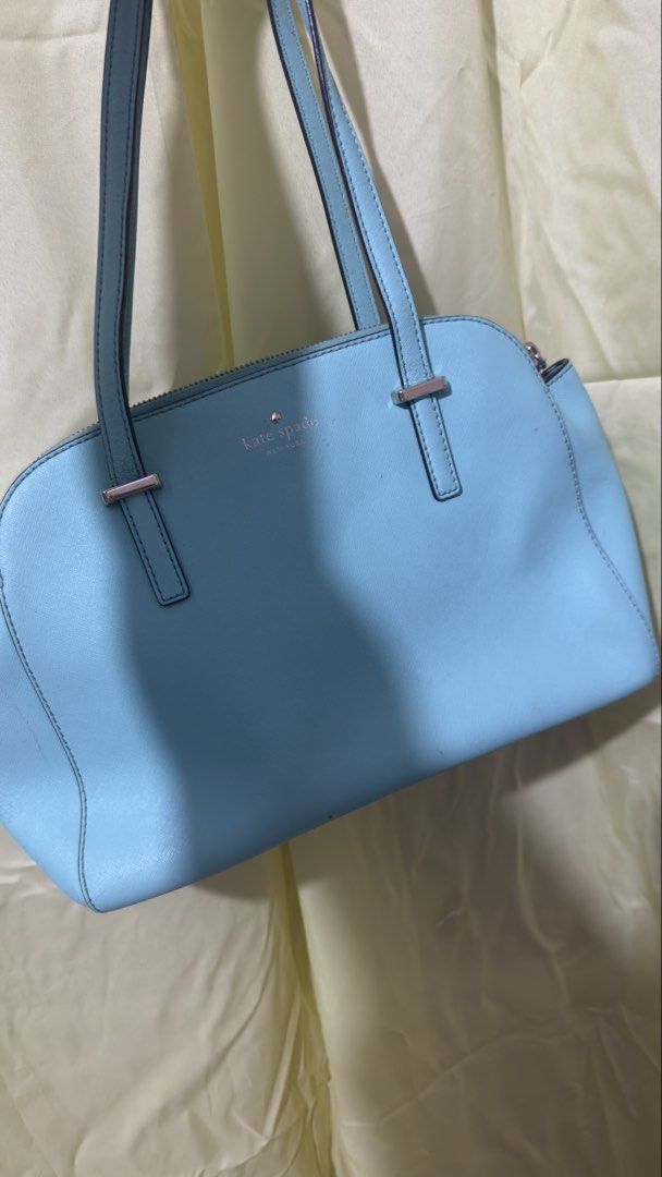 Kate Spade Satchel Handbag (Category: Shoulder Bags) located in Bulacan. Submitted by lovedthingsetc (Listing ID 1432136717, Image 1). Description: - Authentic Kate Spade handbag from the US - Light blue/teal color - Zip closure - Double handles - Spacious interior with pocket - Features the Kate Spade logo.