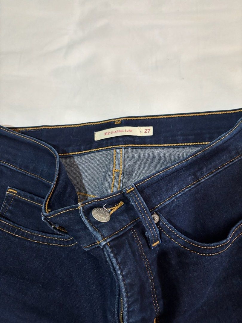 Levi's 312 Shaping Slim Jeans - Size 27 (Category: Jeans) located in Cagayan de Oro. Submitted by miss_xtine (Listing ID 1432075691, Image 3). Description: - Levi's 312 Shaping Slim jeans - Dark wash - Size 27 - Slim fit - Classic five-pocket design - Button and zipper closure - Features the Levi's red tab.
