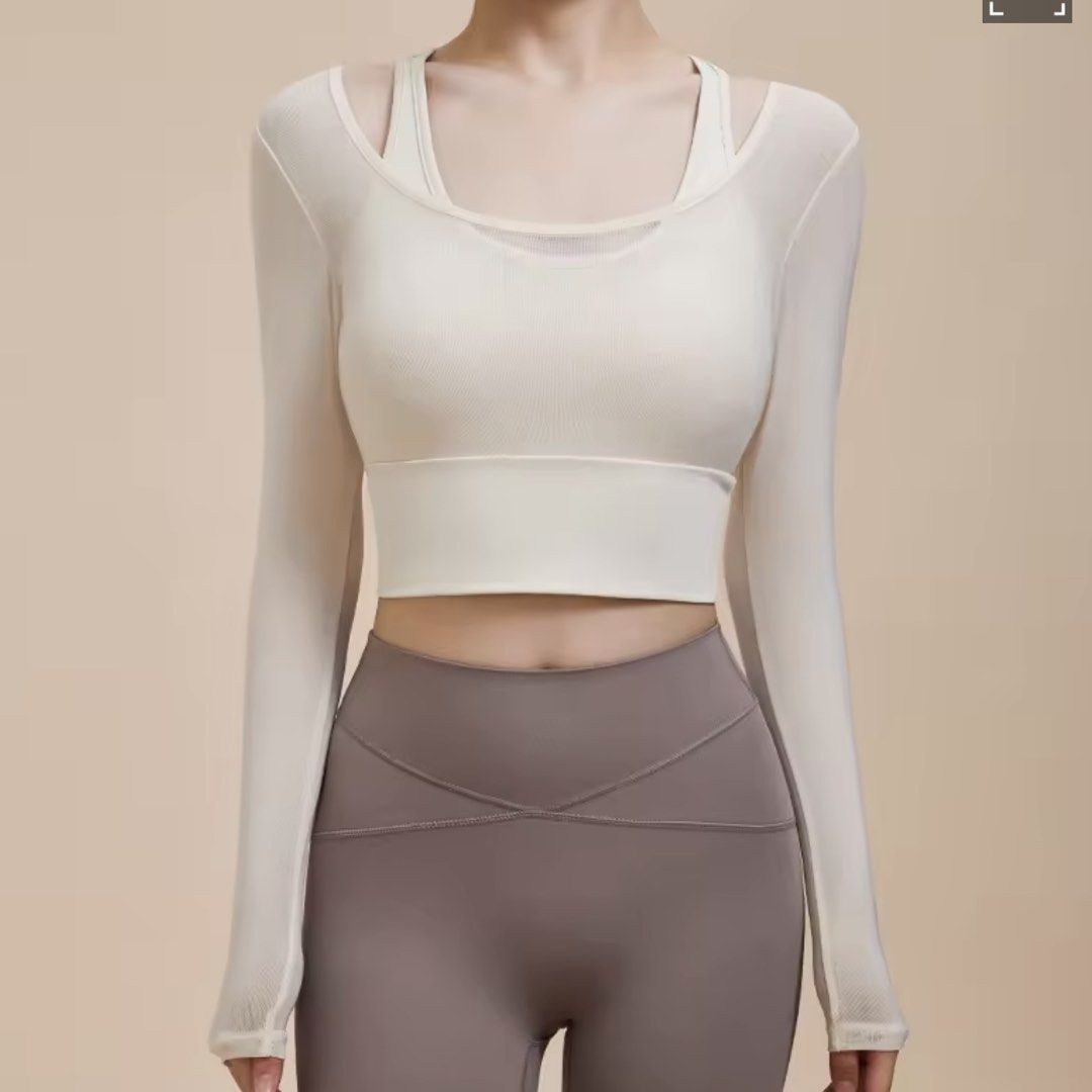 Long Sleeve Mesh Sports Top (Category: Activewear) located in Dasmarinas. Submitted by denmae (Listing ID 1432053644, Image 2). Description: - Long-sleeved sports top - Unique mesh design - Built-in bra for support - Stylish scoop neck - Cropped length - Color milk white - Perfect for workouts and casual wear - Designed for comfort and style Used twice Not a fan of long sleeves for workout.