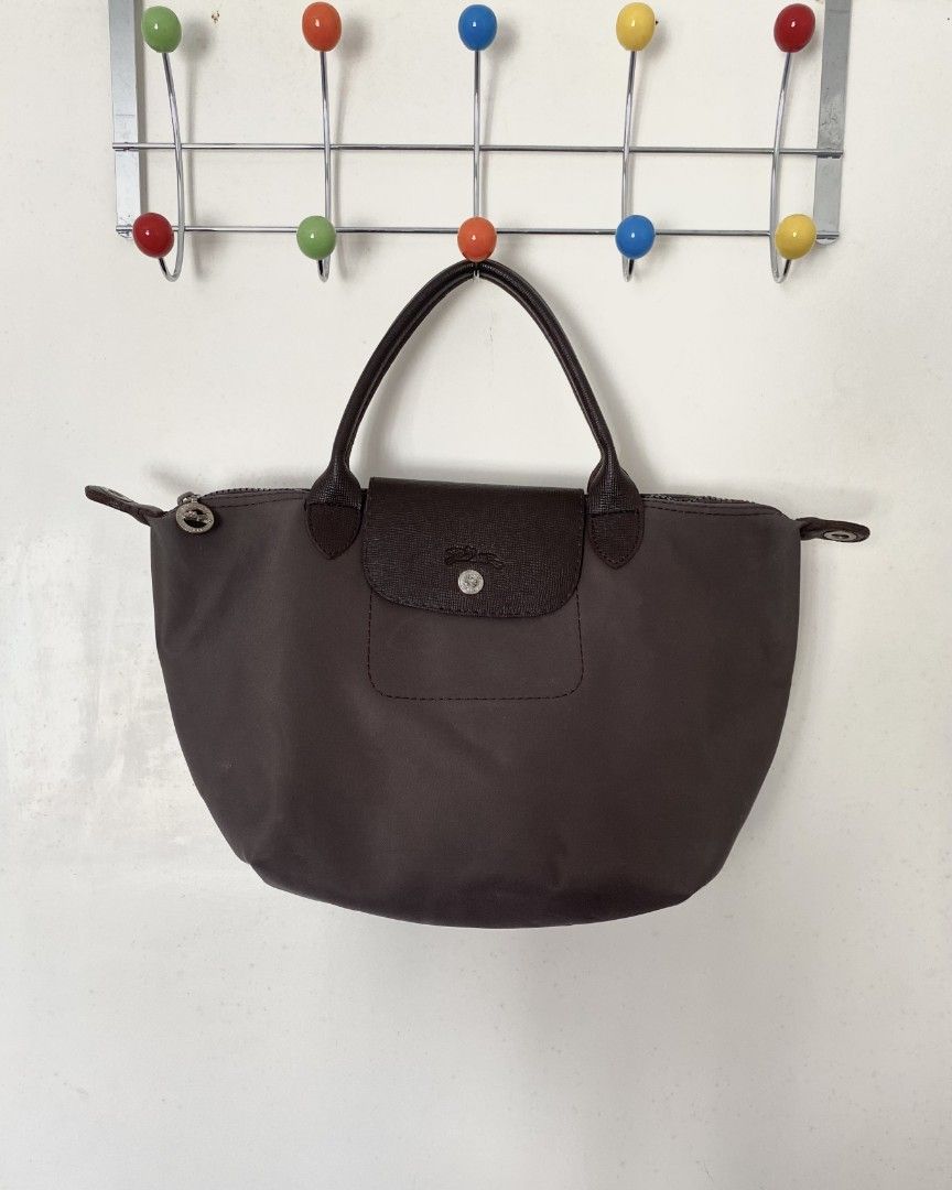 Longchamp Le Pliage Medium (Category: Luxury Bags & Wallets) located in Manila. Submitted by kdclutter (Listing ID 1432082582, Image 1). Description: LONGCHAMP Le Pliage Tote -Color Brown -No Sling Included -Preloved, Not for Picky Buyers DM for more deets!!.