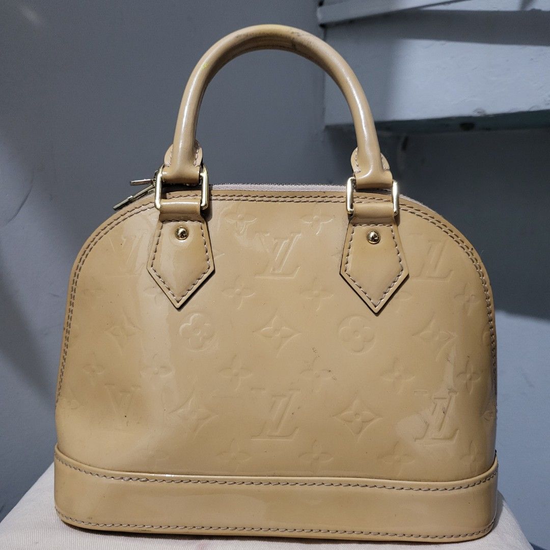 Louis Vuitton Alma BB Vernis Handbag (Category: Luxury Bags & Wallets) located in Iloilo. Submitted by ilonggawithheartfeltbeauty (Listing ID 1432018839, Image 2). Description: NGA Condition : no strap included. bag and clochette only. what you see is what you get. No return and exchange policy thank you. if doubt, please dont buy. 🤎.