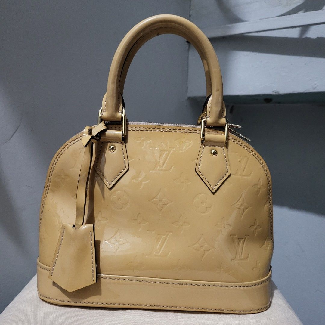 Louis Vuitton Alma BB Vernis Handbag (Category: Luxury Bags & Wallets) located in Iloilo. Submitted by ilonggawithheartfeltbeauty (Listing ID 1432018839, Image 1). Description: NGA Condition : no strap included. bag and clochette only. what you see is what you get. No return and exchange policy thank you. if doubt, please dont buy. 🤎.