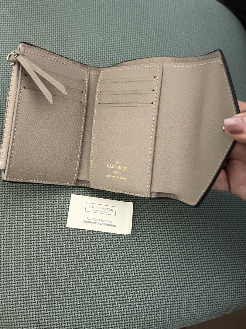LV Empriente Trifold Wallet (Category: Wallets & Card holders) located in Manila. Submitted by mal.eficent (Listing ID 1432052248, Image 2). Description: L0uis Vuitt0n Empriente Wallet Trifold Color: Taupe Condition: New unused Note: This is reeplicaa Meetups in BGC. PIOG No haggling na please..This is soo pretty.