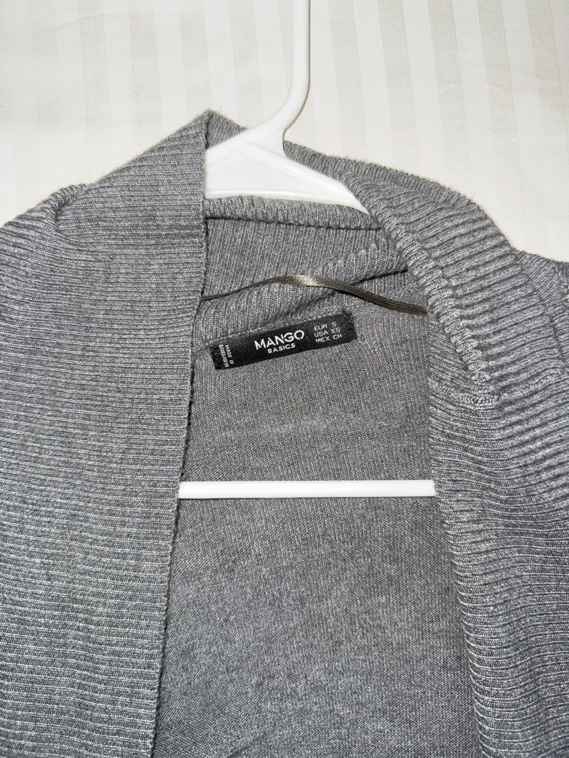 Mango Basics Long Gray Cardigan (Category: Coats, Jackets and Outerwear) located in Manila. Submitted by decluterrrr (Listing ID 1432096576, Image 2). Description: - Gray color - Size S - Shawl collar - Long sleeves - Soft knit material.