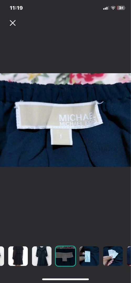 Michael Kors Off-Shoulder Ruffle Dress (Category: Dresses) located in Quezon City. Submitted by greatfindsstuff (Listing ID 1432028658, Image 3). Description: - Michael Kors off-shoulder dress - Dark navy color - Tiered ruffle design - Long sleeves - Pleated skirt - Elastic waist - Perfect for special occasions.