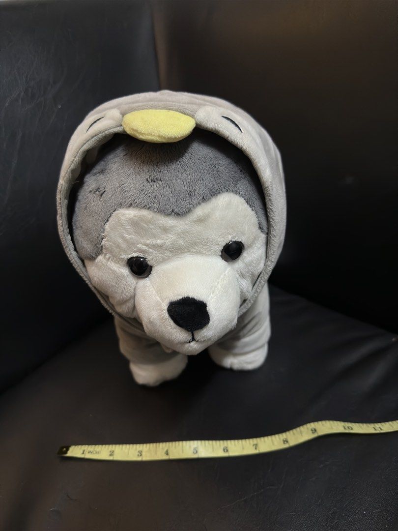 Miniso Husky Plush Toy (Category: Plushies & Soft Toys) located in Manila. Submitted by dxcluttering. (Listing ID 1432181942, Image 2). Description: - Adorable Miniso husky plush toy - Features a gray hoodie - White face and paws with black eyes and nose - Measures 36cm/14.2in - Soft and cuddly material - Perfect for kids and collectors.