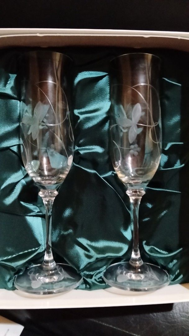 Minton Hand Cut Champagne Flutes (Category: Other Kitchenware & Tableware) located in Davao. Submitted by mmaaeerrr (Listing ID 1432165968, Image 2). Description: - Set of two Minton champagne flutes - Hand-cut with delicate floral design - Includes original box with satin lining - Comes with original Minton tags and documentation - Ideal for collectors or special events.