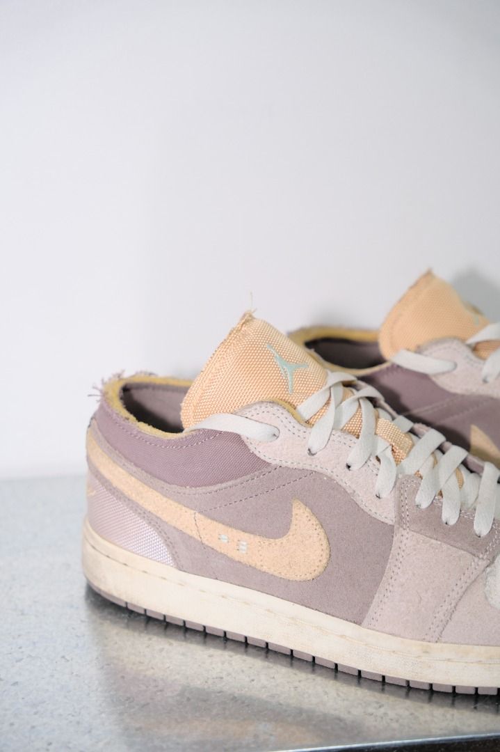 Nike Air Jordan 1 Low SE Craft (Category: Sneakers) located in Quezon City. Submitted by shopsg.co (Listing ID 1432031115, Image 3). Description: - Air Jordan 1 Low SE Craft Taupe - Suede upper - Size tag visible in photos - Bought in Malaysia - Issue: No Box, with stains, needs a bit of cleaning .