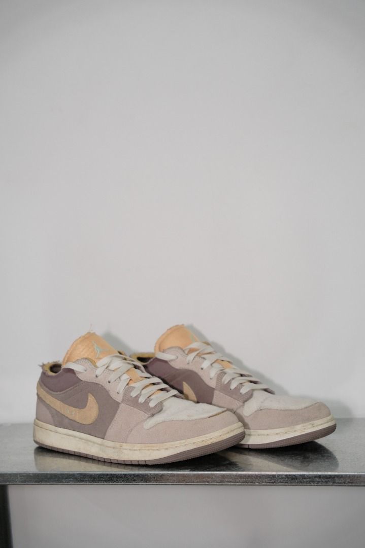 Nike Air Jordan 1 Low SE Craft (Category: Sneakers) located in Quezon City. Submitted by shopsg.co (Listing ID 1432031115, Image 1). Description: - Air Jordan 1 Low SE Craft Taupe - Suede upper - Size tag visible in photos - Bought in Malaysia - Issue: No Box, with stains, needs a bit of cleaning .