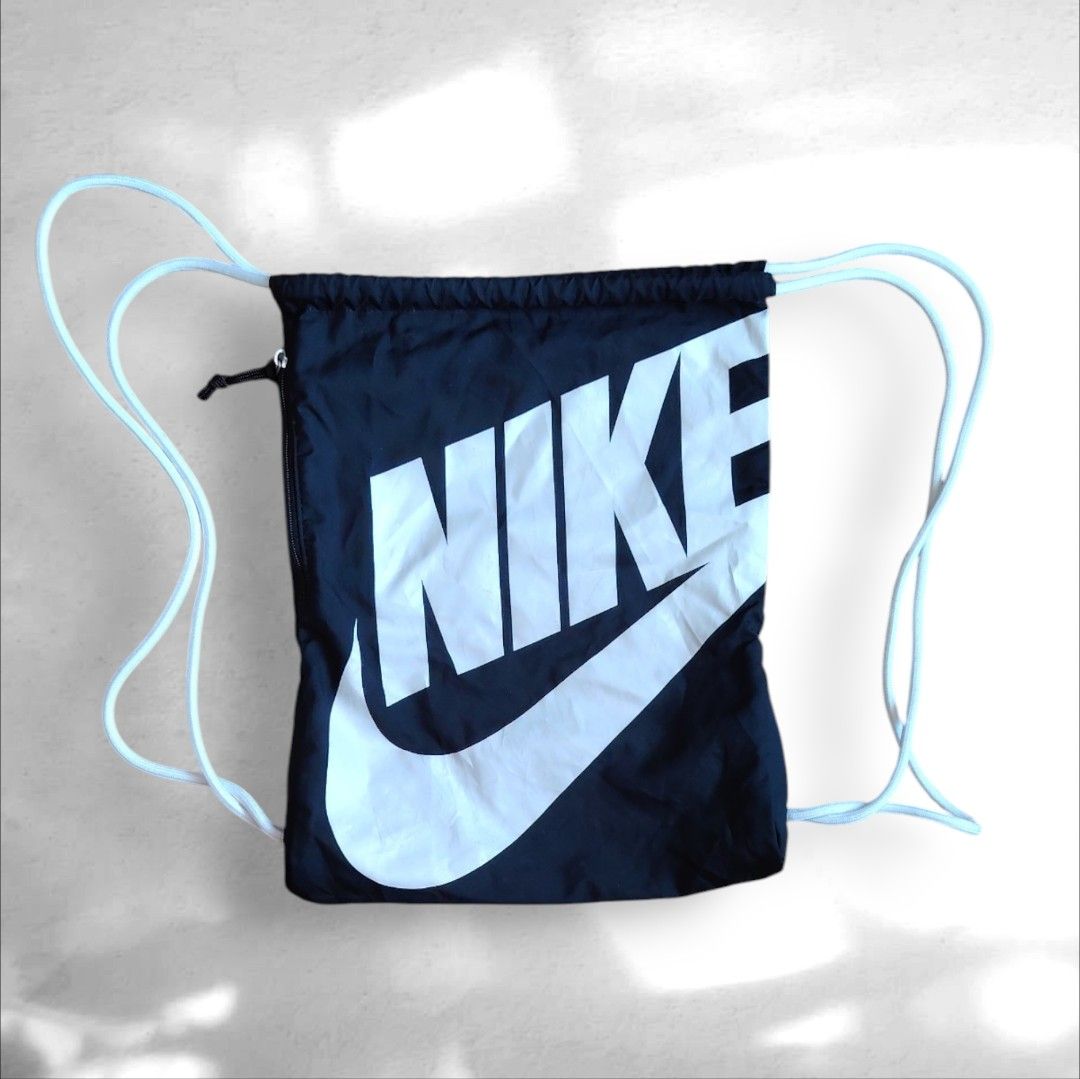 Nike bag (Category: Backpacks) located in Marikina City. Submitted by kingdrel (Listing ID 1432017069, Image 1). Description: Nike Sportswear Heritage Gym Sack (Black/White) W 13 L 17 VERYGOOD CONDITION NO ISSUE COLORATE 9.5-10.