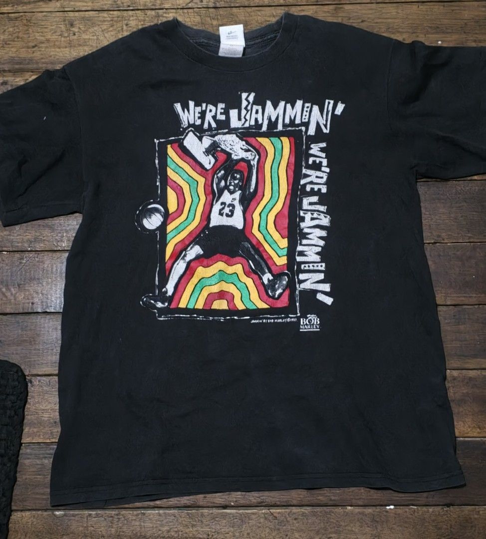 Nike Jordan Bob Marley shirt (Category: Tshirts & Polo Shirts ) located in Manila. Submitted by retroactive_items (Listing ID 1432034113, Image 1). Description: VTG 1990s Nike Jordan Bob Marley We’re Jammin Promo T-shirt - Vintage Nike T-shirt - Made in USA - Size: Large on tag - Dimes: 20.5 x 26" Probably Youth Size - Color Rate: 6-7 /10 - Single Stitch Neck /Sleeve - Probably resized Hem - Double stitch - Pinhole near tag - Crackprint - Feature