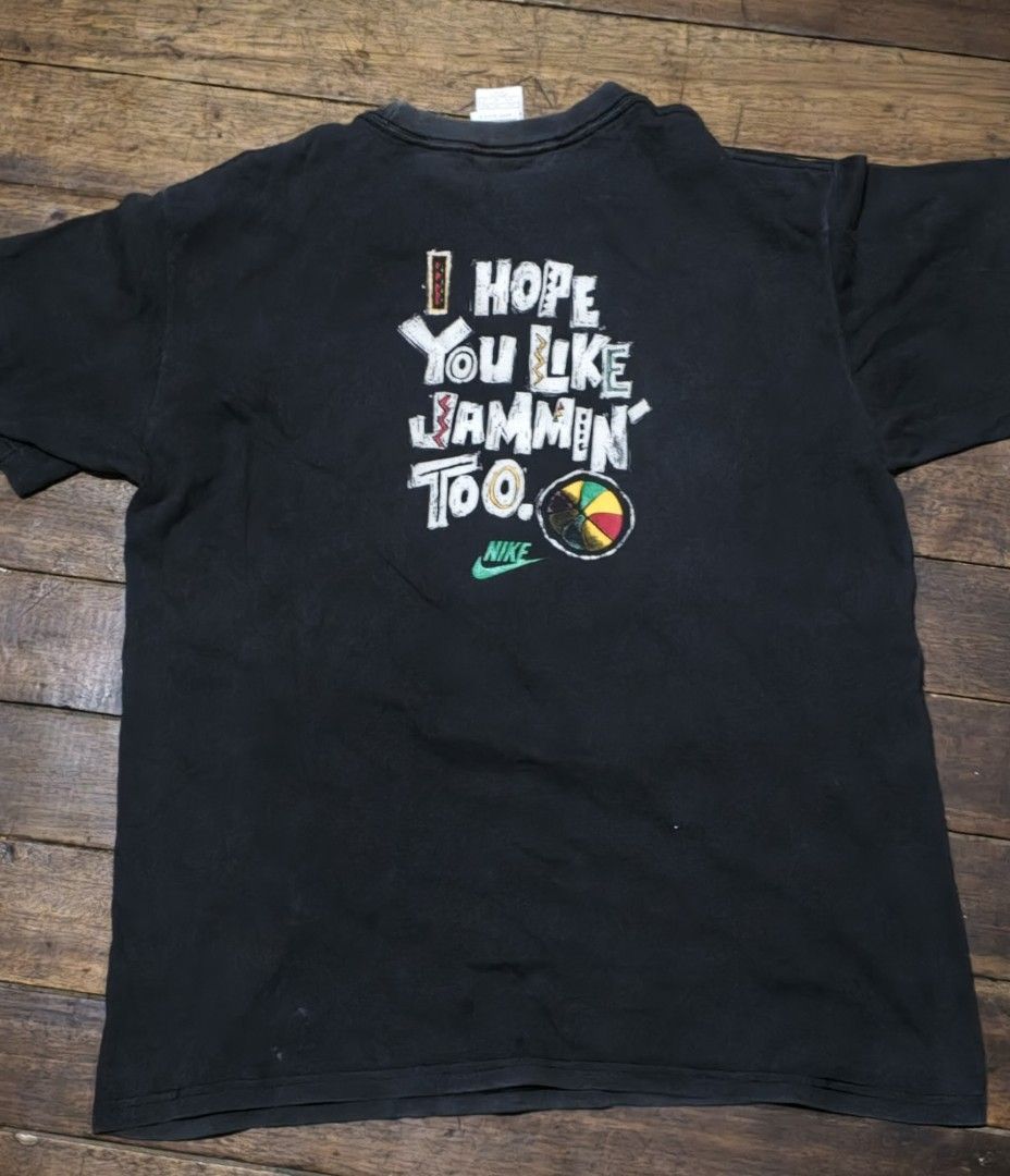 Nike Jordan Bob Marley shirt (Category: Tshirts & Polo Shirts ) located in Manila. Submitted by retroactive_items (Listing ID 1432034113, Image 2). Description: VTG 1990s Nike Jordan Bob Marley We’re Jammin Promo T-shirt - Vintage Nike T-shirt - Made in USA - Size: Large on tag - Dimes: 20.5 x 26" Probably Youth Size - Color Rate: 6-7 /10 - Single Stitch Neck /Sleeve - Probably resized Hem - Double stitch - Pinhole near tag - Crackprint - Feature