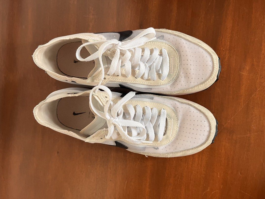 Nike Waffle One - White (Category: Sneakers) located in Paranaque City. Submitted by threadup (Listing ID 1432031855, Image 2). Description: - Nike Waffle One sneakers - Color: White - Size: US 7 - Features: - Black swoosh - White sole - Mesh upper - Includes original red Nike box.