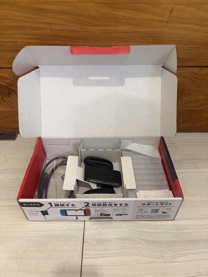 Nintendo Switch 1 with Games and Wireless Controller (Category: Nintendo) located in Paranaque City. Submitted by ryankhloe77 (Listing ID 1432038051, Image 2). Description: Price is Negotiable ✅ Includes: - Nintendo Switch Console - Nintendo Switch Deck - Red and blue Joy-Cons - Joy Con Grip - Joy Con Straps - Charging cable - HDMI Cable Also Included: 🎮🕹️ - Three game cartridges: Just Dance 2021, Pokemon Scarlet, and Mario & Sonic at the Olymp