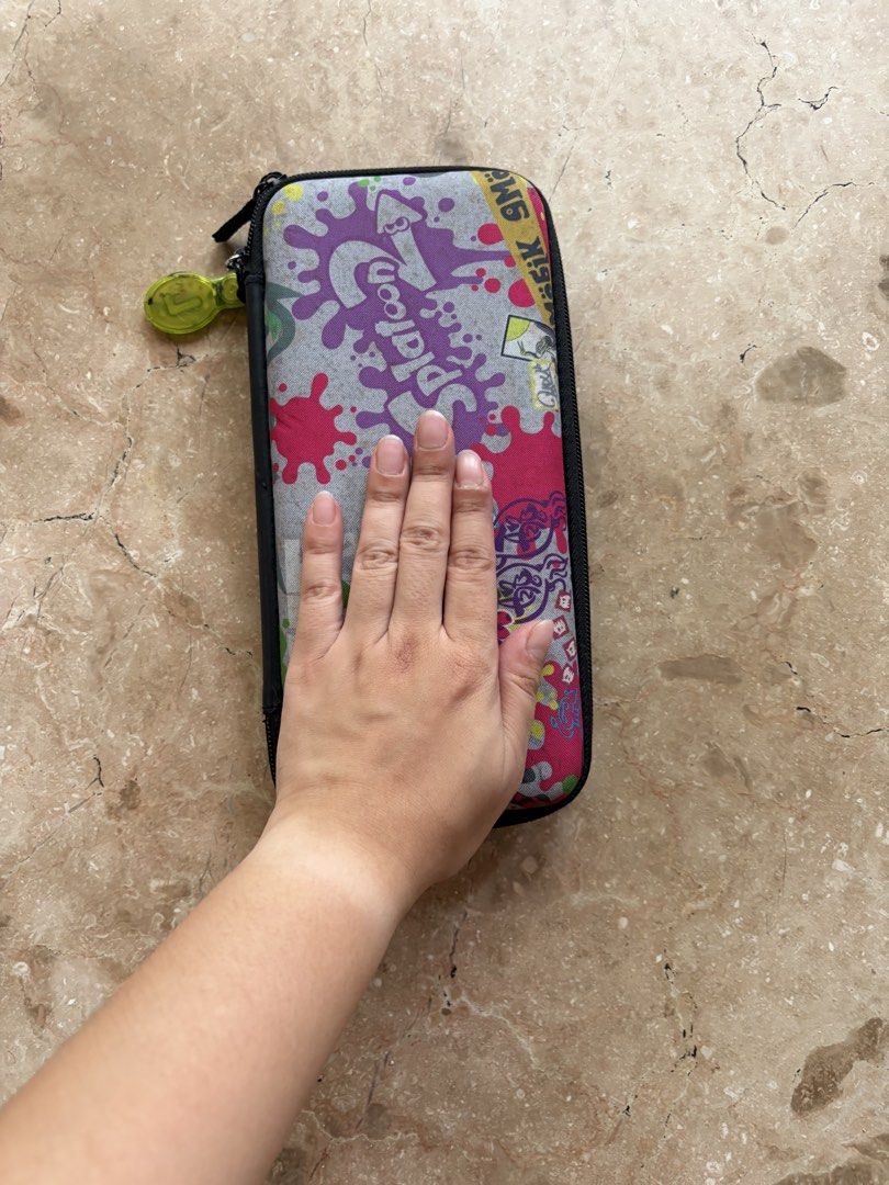 Nintendo Switch Splatoon Case (Category: Cases & Covers) located in Quezon City. Submitted by tidyup.lara (Listing ID 1432000317, Image 2). Description: Sold as is Condition 8/10: used but in good condition.