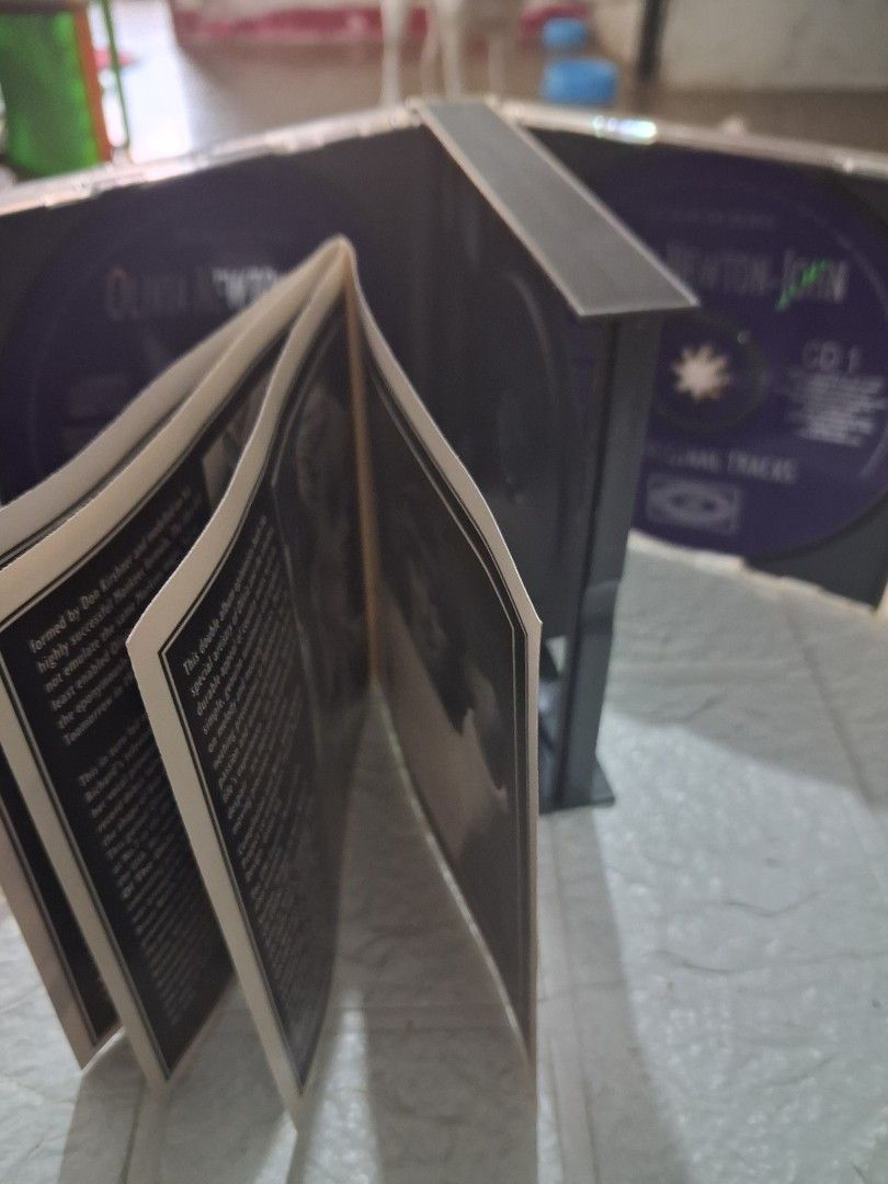 Olivia Newton-John 48 Original Tracks CD (Category: CDs & DVDs) located in Marilao. Submitted by kolektibols (Listing ID 1432036786, Image 3). Description: - Olivia Newton-John CD set featuring 48 original tracks (1971-1975). - Includes hits: "If Not For You," "Banks of the Ohio," "I Honestly Love You," and more. - Set includes two CDs and a booklet. - Complete tracklist on the back of the case. - Produced by EMI..