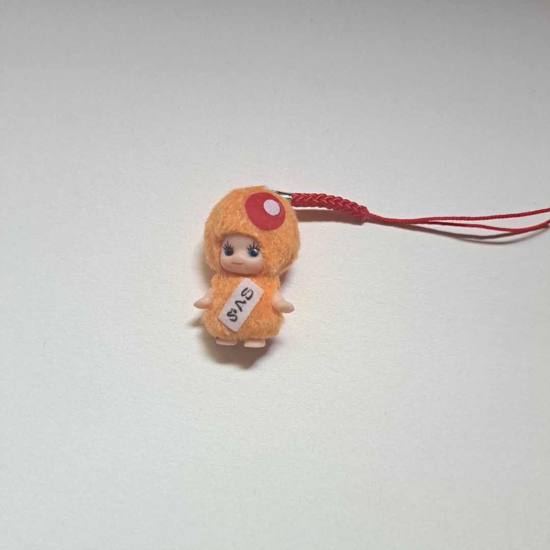 Orange Kewpie Keychain (Category: Character Goods) located in M'Lang. Submitted by ardinelle.finds (Listing ID 1432088941, Image 1). Description: .