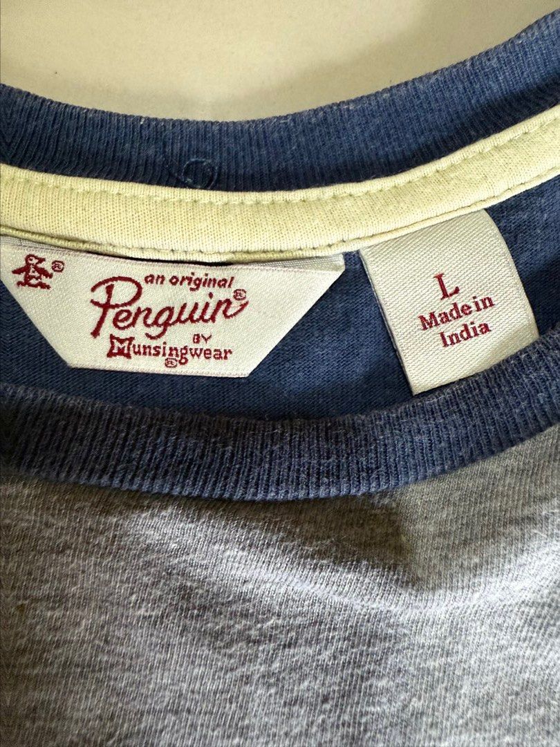Original Penguin T-shirt - Size L (Category: Tshirts & Polo Shirts ) located in Caloocan City. Submitted by mochibolala13 (Listing ID 1432062738, Image 3). Description: - Original Penguin T-shirt - Unique design - Gray body with leaf-patterned pocket - Navy blue sleeves - Full leaf pattern on the back - Made in India - Size: L - teens.