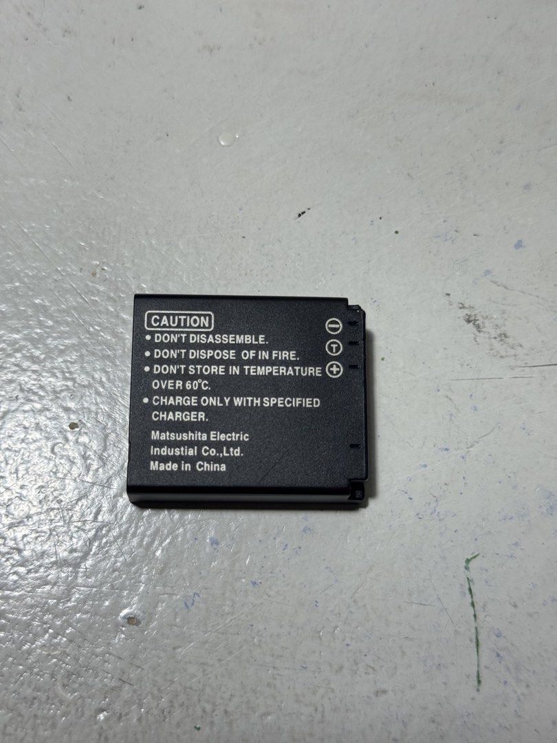 Panasonic Lumix CGA-S005E Battery Pack (Category: Batteries & Chargers) located in Marikina City. Submitted by sidneysundry (Listing ID 1432035384, Image 2). Description: Negotiable, just want it off my hands - Genuine Panasonic Lumix CGA-S005E battery pack. - 3.7V, 1150mAh Li-ion battery. - Features Lumix logo and CE mark. - Safety warnings included. - Manufactured by Matsushita Electric Industrial Co., Ltd. - Made in China..