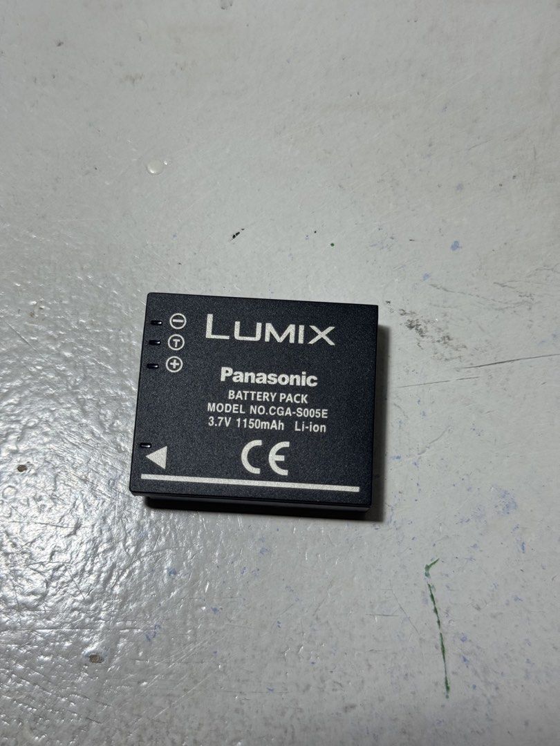 Panasonic Lumix CGA-S005E Battery Pack (Category: Batteries & Chargers) located in Marikina City. Submitted by sidneysundry (Listing ID 1432035384, Image 1). Description: Negotiable, just want it off my hands - Genuine Panasonic Lumix CGA-S005E battery pack. - 3.7V, 1150mAh Li-ion battery. - Features Lumix logo and CE mark. - Safety warnings included. - Manufactured by Matsushita Electric Industrial Co., Ltd. - Made in China..