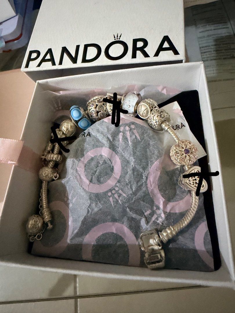 Pandora Bracelet with Charms (Available per piece) (Category: Bracelets) located in Taguig. Submitted by michelledc2 (Listing ID 1422034579, Image 1). Description: 15,000 last price -12charms 1 chain (Available for individual purchase) * Heart safety chain * Zodiac Pisces Star Sign * Chinese Zodiac Monkey Dangle Charm * Love is all Around Charm * Heart Safety Chain Charm * White murano glass * Letter M Dangle Clear CZ Charm * Shimmering Medallion