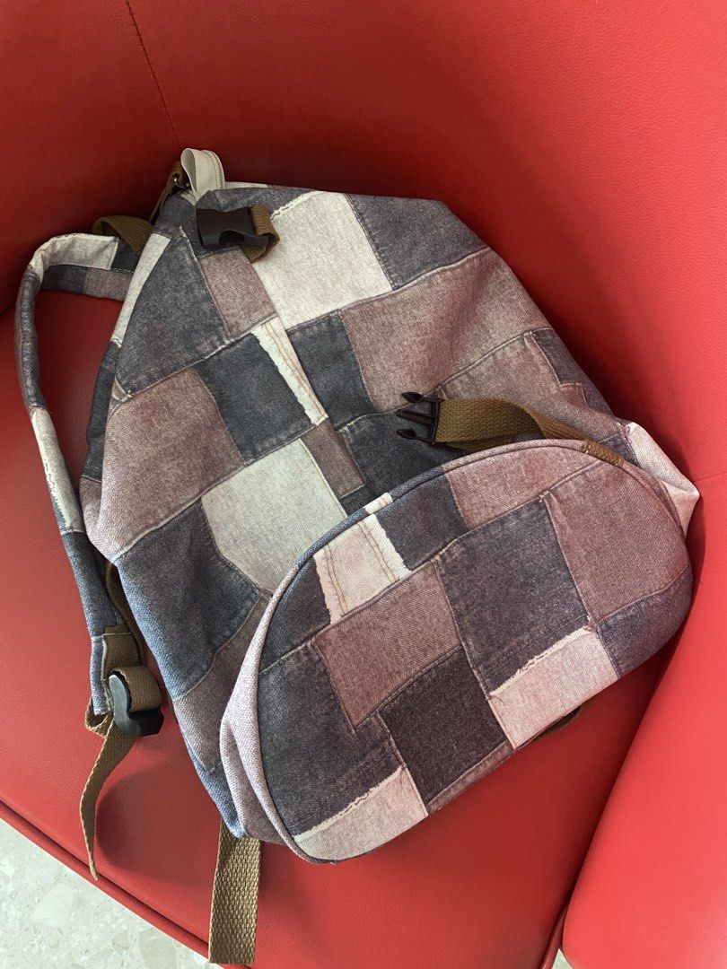 Patchwork Backpack (Category: Backpacks) located in Singapore. Submitted by msgj_mum (Listing ID 1432030788, Image 6). Description: - Stylish patchwork design - Multiple compartments - Adjustable straps - Secure buckle closure - Versatile neutral tones.