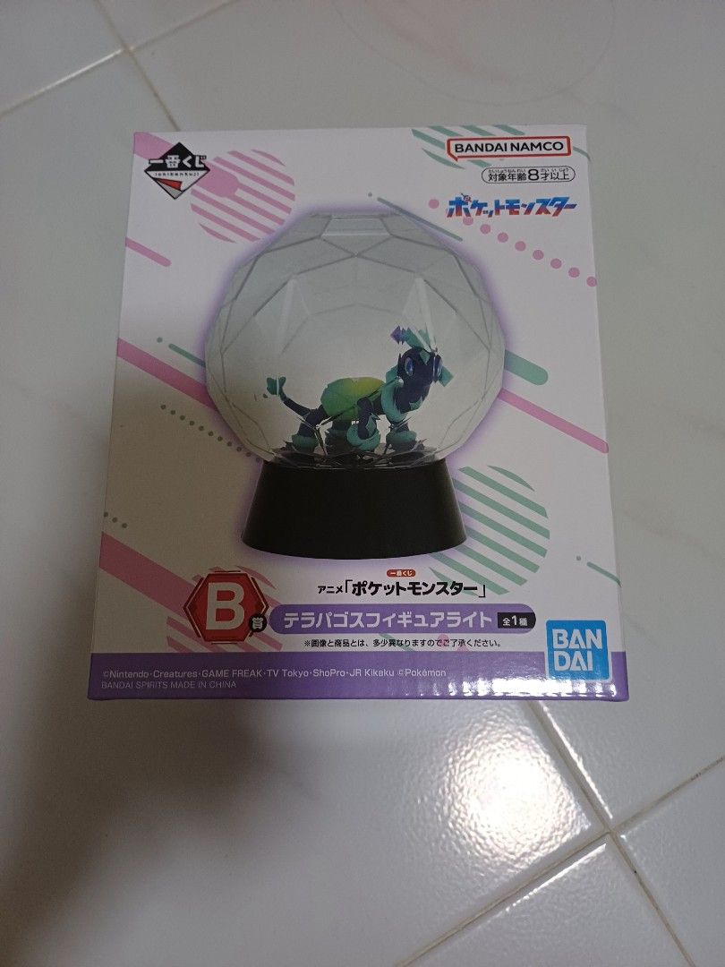 [BNIB] Pokemon Terapagos Figure Light Lamp Bandai (Category: Toy Figures) located in Singapore. Submitted by anythunderthesun (Listing ID 1432072270, Image 2). Description: Brand new Bandai Terapagos figure light Encased in a geometric dome Base lights up to illuminate the figure Comes in original packaging.