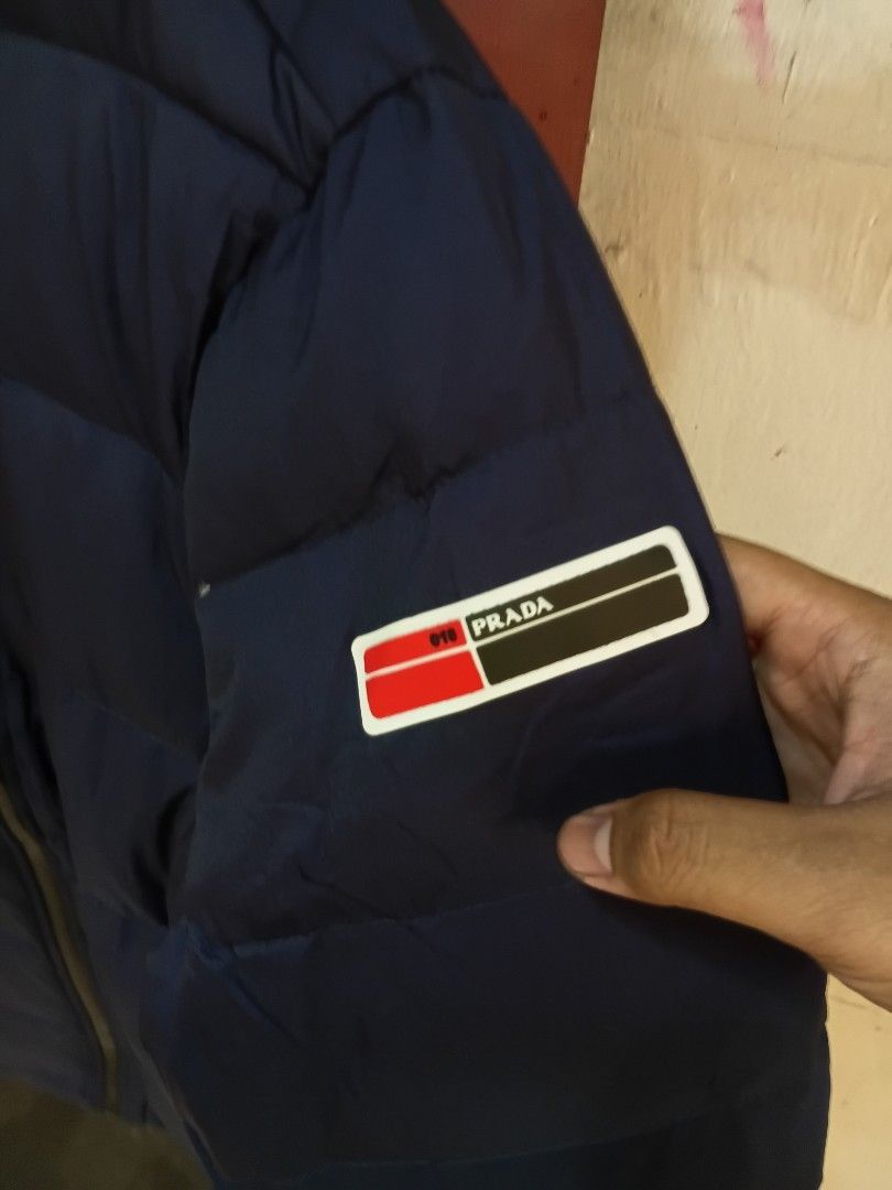 Prad4 puffer jacket (Category: Luxury Apparel) located in Navotas City. Submitted by DalVintage (Listing ID 1432188378, Image 3). Description: XL 23 WIDTH 29 LEDTH.