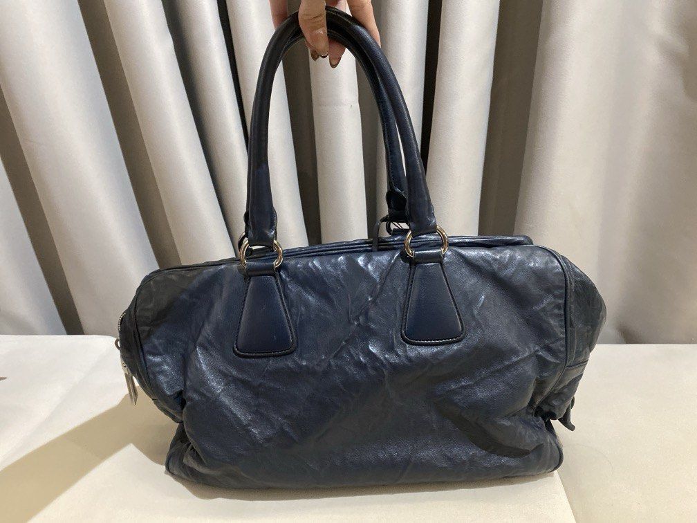 Prada Nappa Antique Leather Bag (Category: Luxury Bags & Wallets) located in Manila. Submitted by findsbyiya (Listing ID 1432128670, Image 2). Description: - ₱15,000 + SF - price is negotiable - good condition! - authentic RFS: decluttering stuff MOP: Gcash/cash MOD: Lalamove (can do meetups) no returns/refunds!.