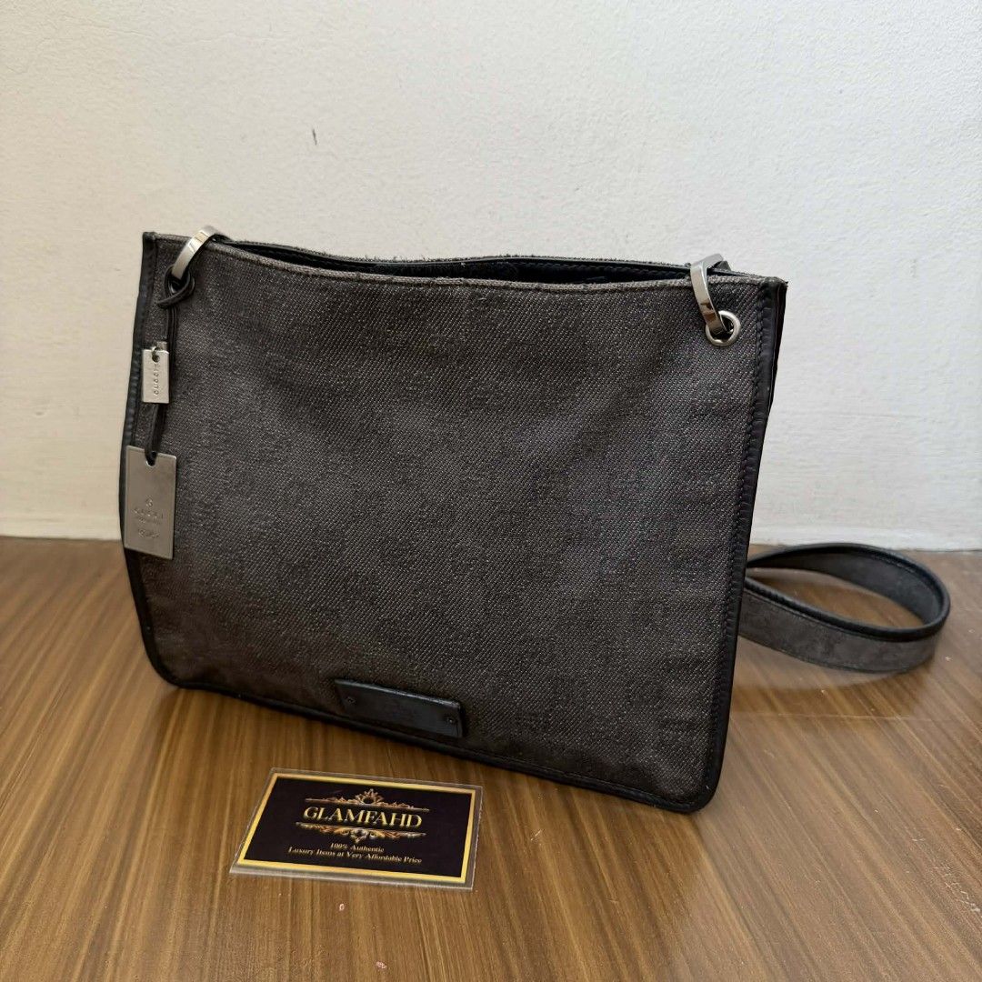 Pre Owned Authentic GUCCI GG Canvas Crossbody Bag (Category: Luxury Bags & Wallets) located in Paranaque City. Submitted by Glamfahd (Listing ID 1432051208, Image 2). Description: Pre Owned Authentic GUCCI GG Bag Inclusion/s: None Condition Well Used condition Marks on exterior Marks on interior Bag is really a great buy! Please manage your expectations as you are buying an authentic second hand item at a fraction of the cost.