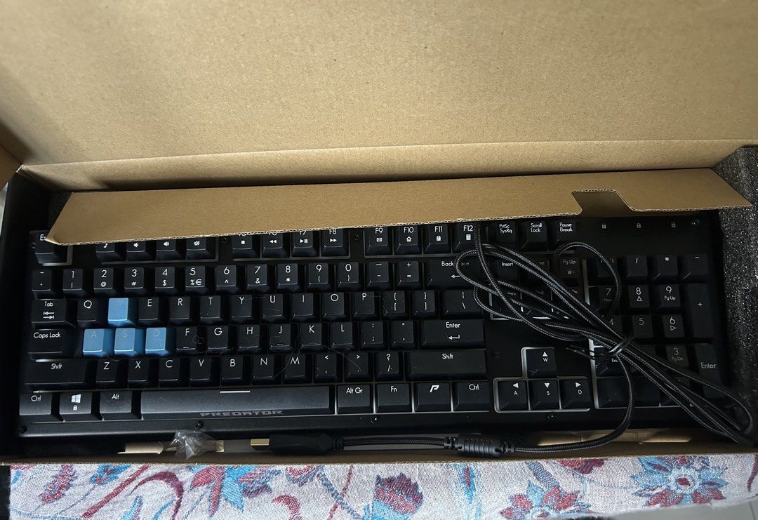 Predator Aethon 100 Gaming Keyboard (104 Key with numpad) (Category: Computer Keyboard) located in Makati City. Submitted by jimjums (Listing ID 1432008272, Image 2). Description: Used for three days, box is damaged but everything inside is perfectly fine RFS: Need different keyboard with different specs ORIGINAL PRICE: 2,695php–3,699php Product Specs (Datablitz): • 19 Anti-ghosting Key Switches • RGB LED 16.8M Colors - Teal Blue Lighting Effects