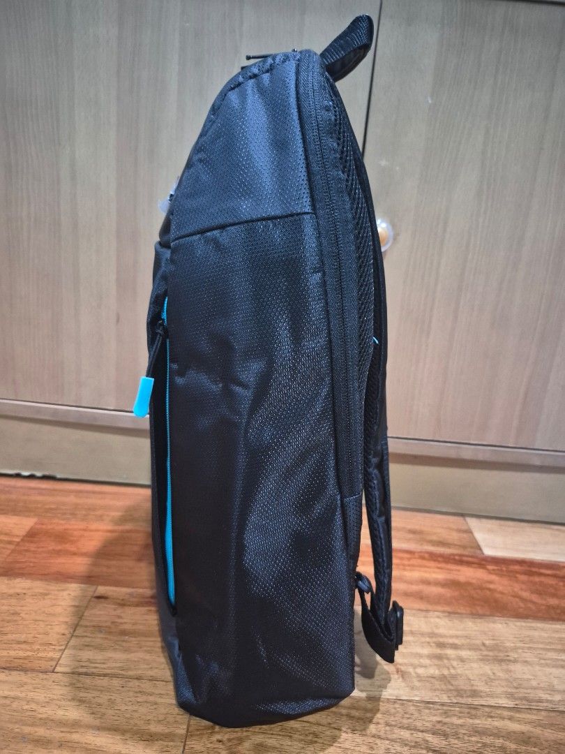 Predator Gaming Backpack (Category: Backpacks) located in Cainta. Submitted by gerlaystreasures (Listing ID 1432193667, Image 2). Description: -Acer Black Predator gaming backpack - Large main compartment with blue accent - Padded back panel for comfort - Adjustable shoulder straps - Top handle for easy carrying - Multiple compartments and pockets for organization - Features the Predator logo RFS: Fund sourcing.