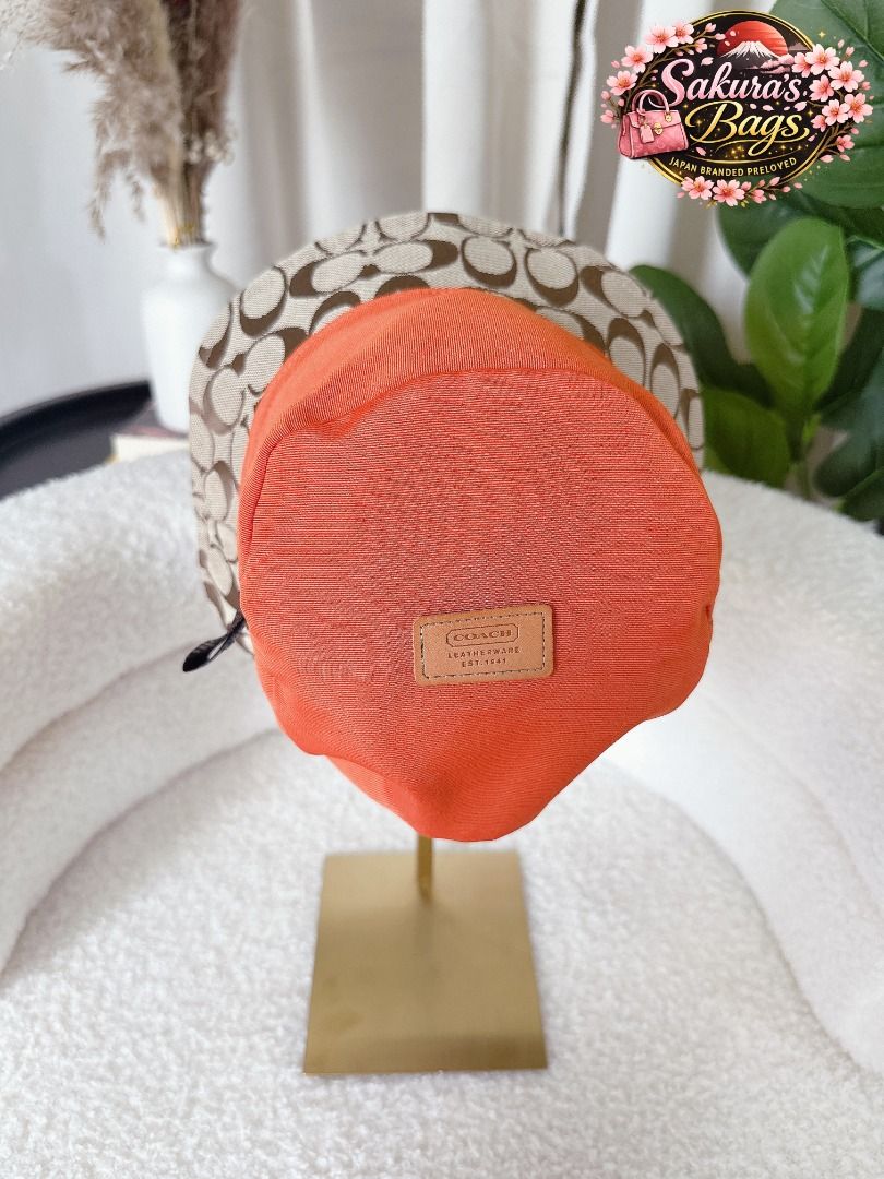 Pre-Owned Coach Signature Monogram Canvas Bucket Hat Khaki Tan Brown Leather Hat (Category: Hats & Beanies) located in Liliw. Submitted by sakurabagsjapan (Listing ID 1432022862, Image 2). Description: Unique color combo — standout pero classy 🔥 ✔️ Size: P/S (Small fit) ✔️ Lightweight & comfortable ✔️ Signature design 💯 Preloved but in excellent condition ✔️ No flaws / super clean / ready to wear ✨ Authenticity guaranteed. If proven fake, full 