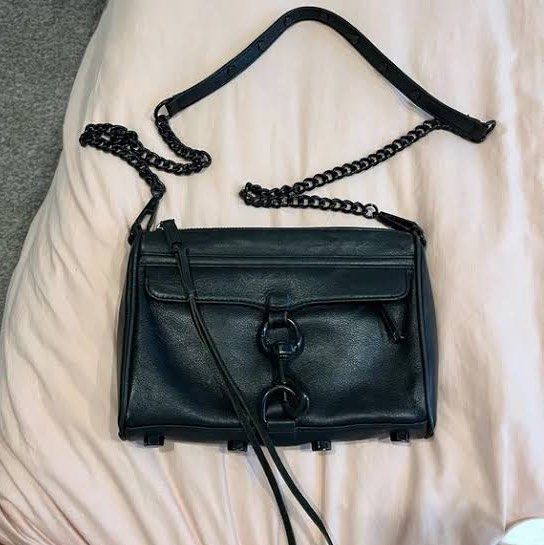 Rebecca Minkoff MAC Crossbody Leather Bag (Category: Luxury Bags & Wallets) located in Taguig. Submitted by stylewearabouts (Listing ID 1432007273, Image 1). Description: - Rebecca Minkoff black leather crossbody bag - Chain strap - Flap closure with metal clasp - Includes dust bag and extra strap - Interior with Rebecca Minkoff label - Perfect for everyday or special occasions .