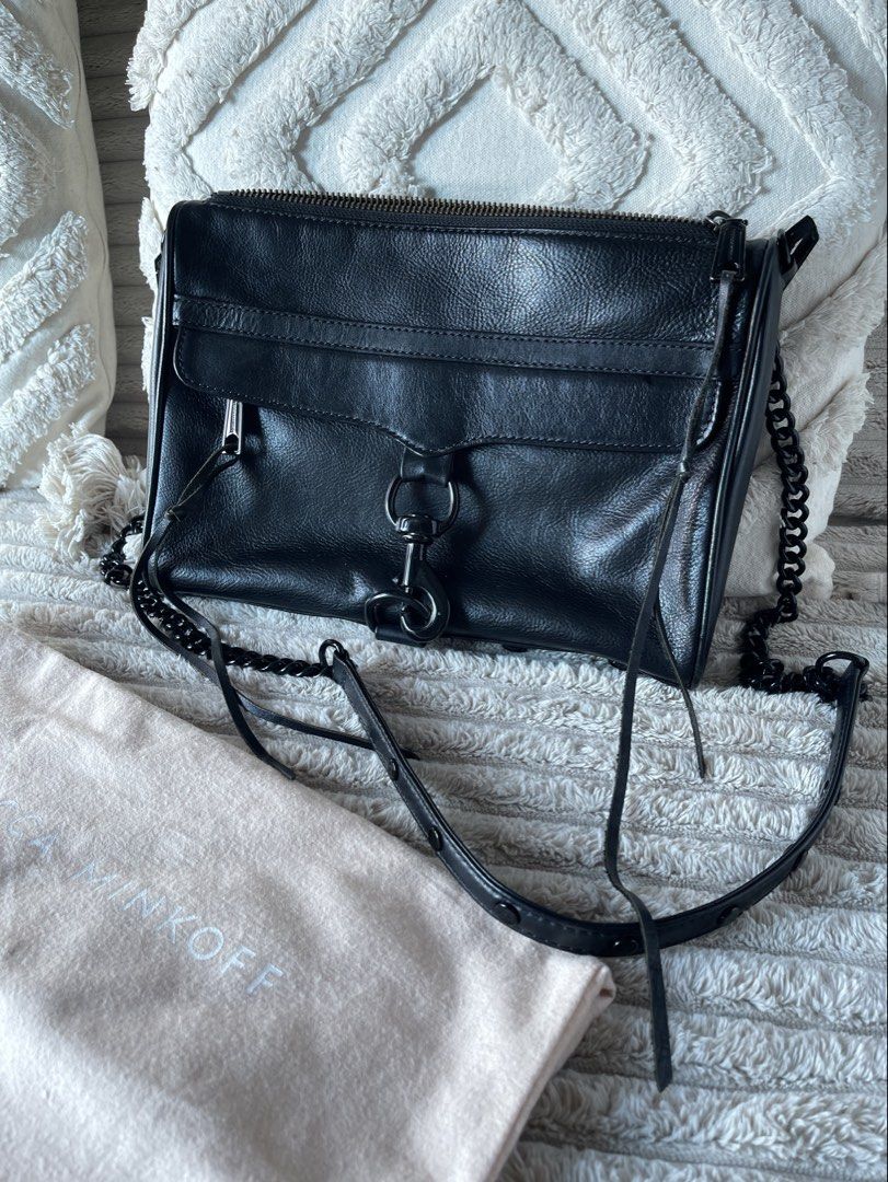 Rebecca Minkoff MAC Crossbody Leather Bag (Category: Luxury Bags & Wallets) located in Taguig. Submitted by stylewearabouts (Listing ID 1432007273, Image 3). Description: - Rebecca Minkoff black leather crossbody bag - Chain strap - Flap closure with metal clasp - Includes dust bag and extra strap - Interior with Rebecca Minkoff label - Perfect for everyday or special occasions .