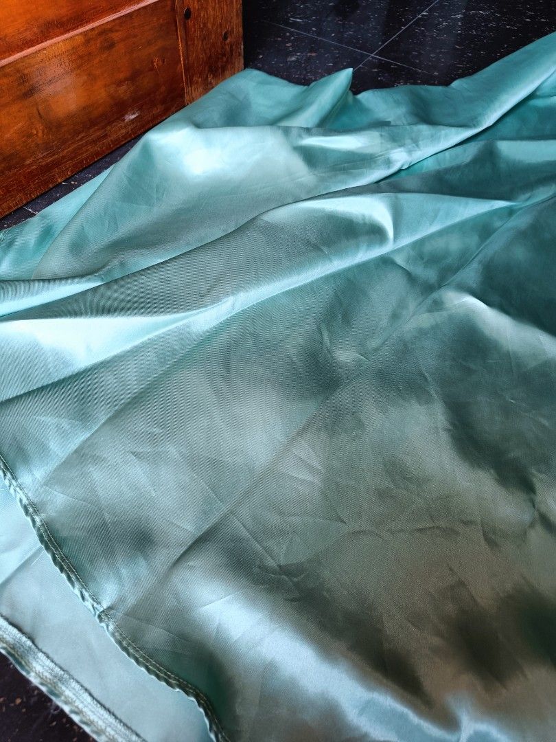 Sage Green Wrap-up Satin skirt (Category: Skirts) located in Orani. Submitted by mbfb_btn (Listing ID 1432056879, Image 1). Description: - Sage green satin skirt - Flowing design - Tie-up details - Subtle sheen - Comfortable feel - Perfect for special occasions or everyday wear.