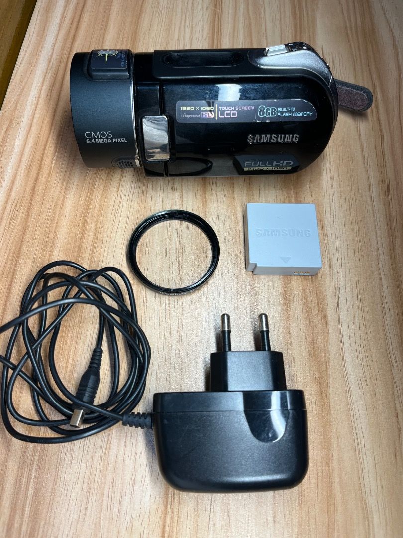 Samsung Camcorder (Category: Cameras) located in Baguio. Submitted by ibarrajenn02122 (Listing ID 1432055109, Image 1). Description: Samsung VP-HMX20C (2008) 🏷️₱6,500 Core Specs Sensor: 1/1.8” CMOS (Large for its class, great for low light). Resolution: Full HD 1920 x 1080 video; 6.4MP stills. Lens: 10x Optical Zoom with a bright f/1.8 aperture. Storage: 8GB internal memory + SD/SDHC card slot. No issue No functional issue Sign of use only Open 